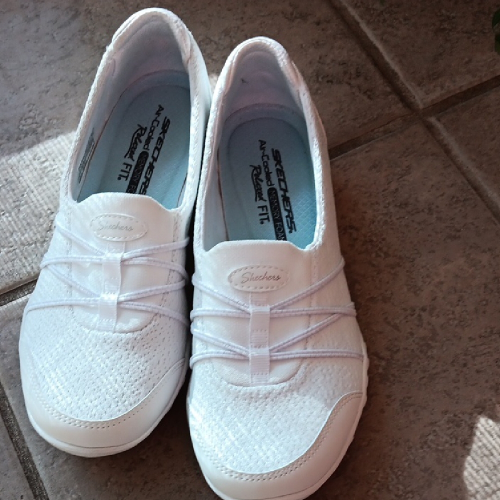 Skechers Women's White Slip-On Sneakers